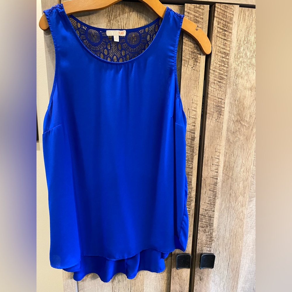 GBX lace back asymmetrical tank, size large.